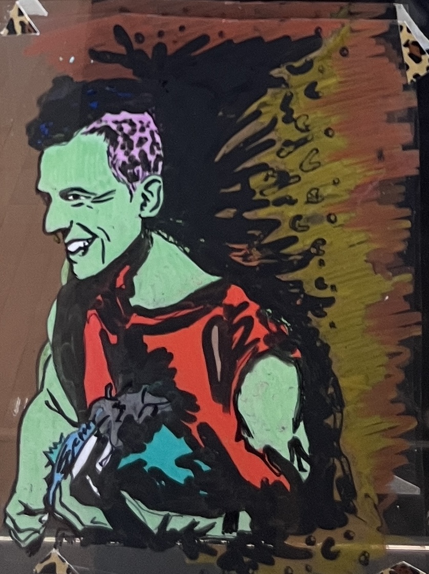 Half-body drawing of a punk musician playing guitar and smiling broadly. Leopard pattern on sides of head and on duct tape triangles in corners, with abstracted leopard pattern in background.&nbsp; This picture represents the joy of music, self-expression, creative&nbsp; outlets, and revisiting the past with newfound joy appreciation.